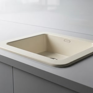 Cream-white solid surface sink